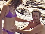 Carla Bruni caught in bikini with husband