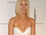 Gwyneth Paltrow flaunting her long legs and hot cleavage in mini dress