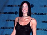 Courteney Cox showing nice big tits in see thru