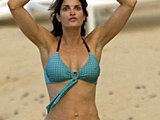 Stephanie Seymour caught in a tiny bikini on the beach sexy candids