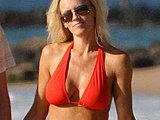 Jenny Mccarthy caught in a tiny bikini with dude Hawaii Beach candids