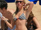 Ashley Tisdale flaunting her sexy body in a tiny bikini on the beach