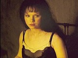 Thora Birch exposes huge natural tits in lingerie