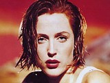 Gillian Anderson bares her gorgeous breasts