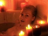 Portia De Rossi taking romantic bath with candles