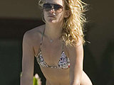 Kate Hudson flaunting her sexy ass in a teeny bikini on the beach
