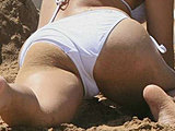 Vanessa Hudgens caught in a tiny white bikini with young boyfriend