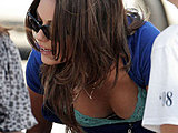 Mila Kunis flashing her amazingly deep cleavage paparazzi candids pics