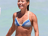 Kelly Ripa flaunting her tight sexy body in a tiny wet bikini