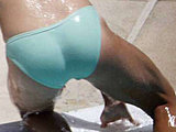 Kelly Ripa flashing her sweet ass in tiny wet bikini poolside candids