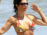 Lisa Rinna flaunting her tight sexy body in a tiny bikini candids