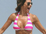 Lisa Rinna flaunting her still hot tight body in a striped bikini