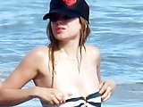 Avril Lavigne bikini nipple slip at the beach in Malibu