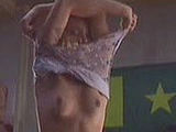 Amy Smart shows her nice tits